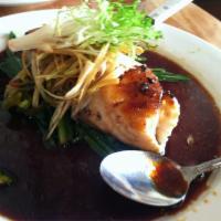 Pan Seared Chilean Sea Bass · Served with rice.