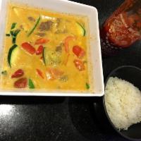 Panang Curry · Rich thick panang curry sauce, cooked with coconut milk. Served with steamed rice. Hot and s...