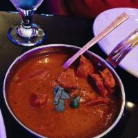 Chicken Tikka Masala · Boneless pieces of barbecued chicken tikka cooked in the sauce of fresh tomatoes, garlic, an...