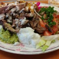 Mixed Shawarma · Thinly sliced roasted meat sandwich. 