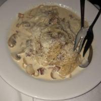 Mushroom Cream Pasta · Mushroom garlic and bacon cream sauce with linguine.