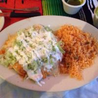 Enchiladas · 3 pieces soft corn tortillas rolled with our salsa verde. Topped with lettuce, sour cream, c...