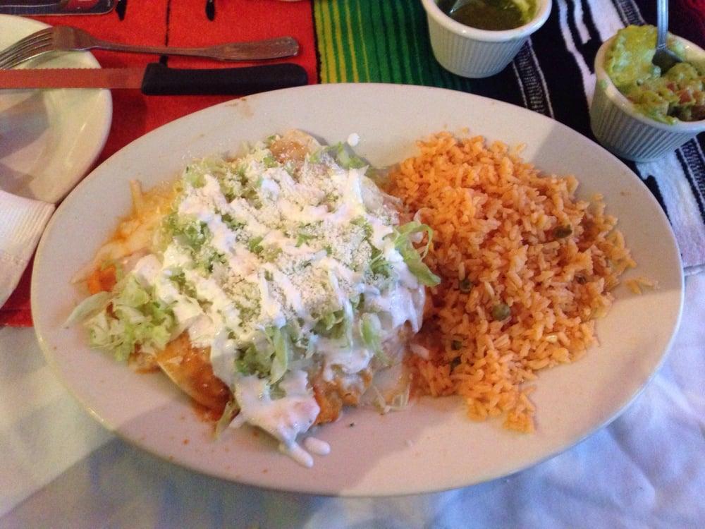 Enchiladas · 3 pieces soft corn tortillas rolled with our salsa verde. Topped with lettuce, sour cream, cheese and your choice of veggie. Served with rice.