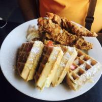 Chicken and Waffles · 3 hand battered fried chicken strips or 2 whole fried chicken wings with a Belgium waffle.
