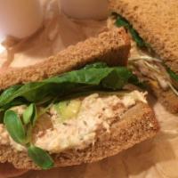Tuna Salad Sandwich · On whole wheat bread with lettuce, sprouts and tomatoes.