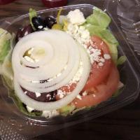 Greek Salad · Lettuce, tomatoes, cucumbers, beets, onion, pepperocini, olives and feta cheese. Includes pi...