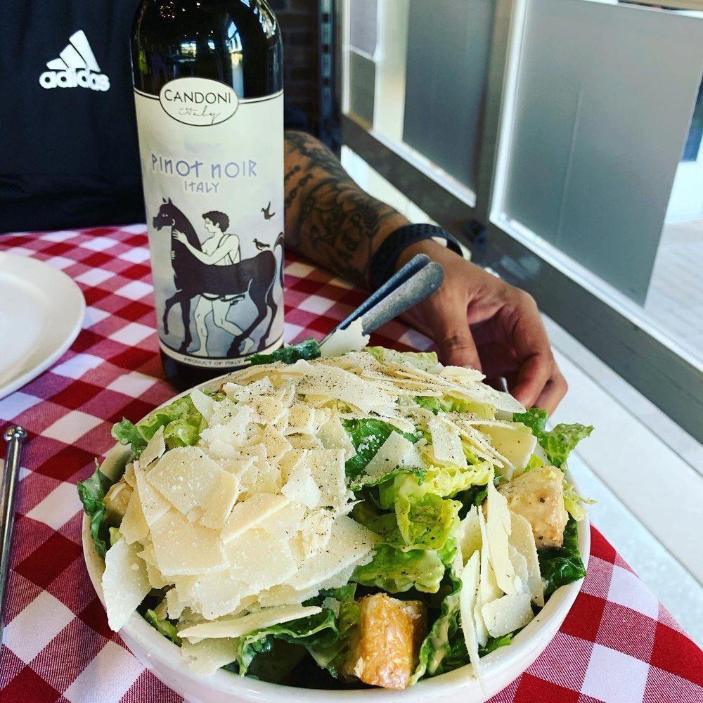 Caesar Salad · Romaine lettuce shaved Italian cheese, coal oven baked croutons, traditional Caesar dressing. Add fresh mozzarella, Genoa salami or grilled chicken for an extra charge.