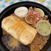 Pulled Beef Chimichanga · Rice, refried beans, pico de gallo, guacamole and sour cream.