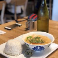 Thai Red Curry · Bamboo shoot and bell pepper in red chilli paste coconut curry.