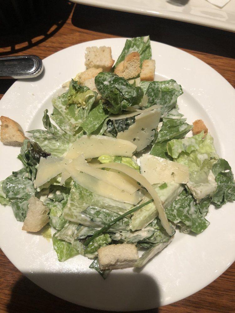 Caesar Salad · A classic with shaved parmesan & croutons. Dressing served on side.