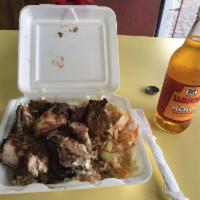 Jerk Chicken · Served with white rice or rice and peas, steam vegetables or salad. Spicy.
