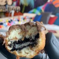Fried Oreos · 4 oreos tossed in our own pancake mix and fried until fluffy golden. Served with chocolate s...