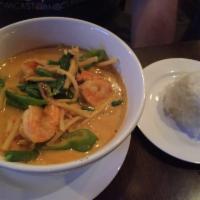 Red Curry · Comes with bamboo shoots, string beans, long hot and fresh basil. Spicy.