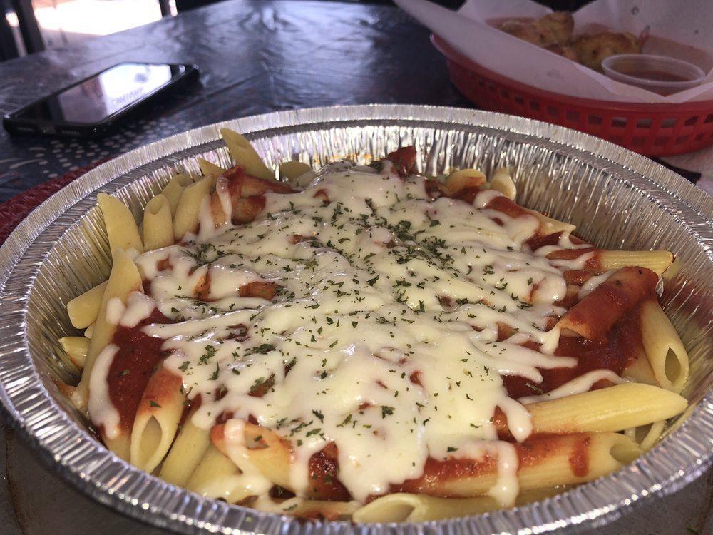 Baked Ziti · Served with our homemade marinara sauce topped with mozzarella cheese.