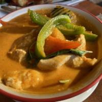 Pumpkin Curry · Pumpkin, chicken, bell pepper, sweet basil in red coconut curry sauce.