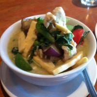 Green Curry · Pork, bamboo shoots, bell pepper, zucchini, sweet basil cooked in green coconut curry sauce.