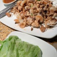 Lettuce Wraps · Fresh shiitake mushrooms, water chestnuts and scallions tossed in spicy ginger soy sauce.