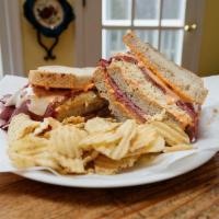 The Leaning Tower of Pica Hot Kitchen Sandwiches · 
