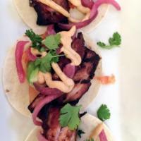 Food Truck Taco · Grilled pork belly tacos with house kimchi, avocado, pickled red onions, cilantro, chipotle ...