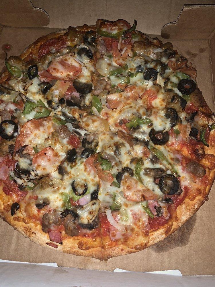Supreme Pizza · This one's loaded with 10 toppings. Pepperoni, sausage, beef, ham, mushrooms, tomatoes, onion, green pepper and black olives.