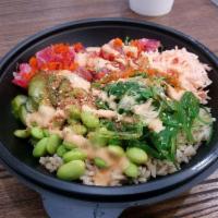 Miso Surf · Sweet miso blend served with tuna and spicy crab. Scallion, pickled cucumber, furikake, masa...