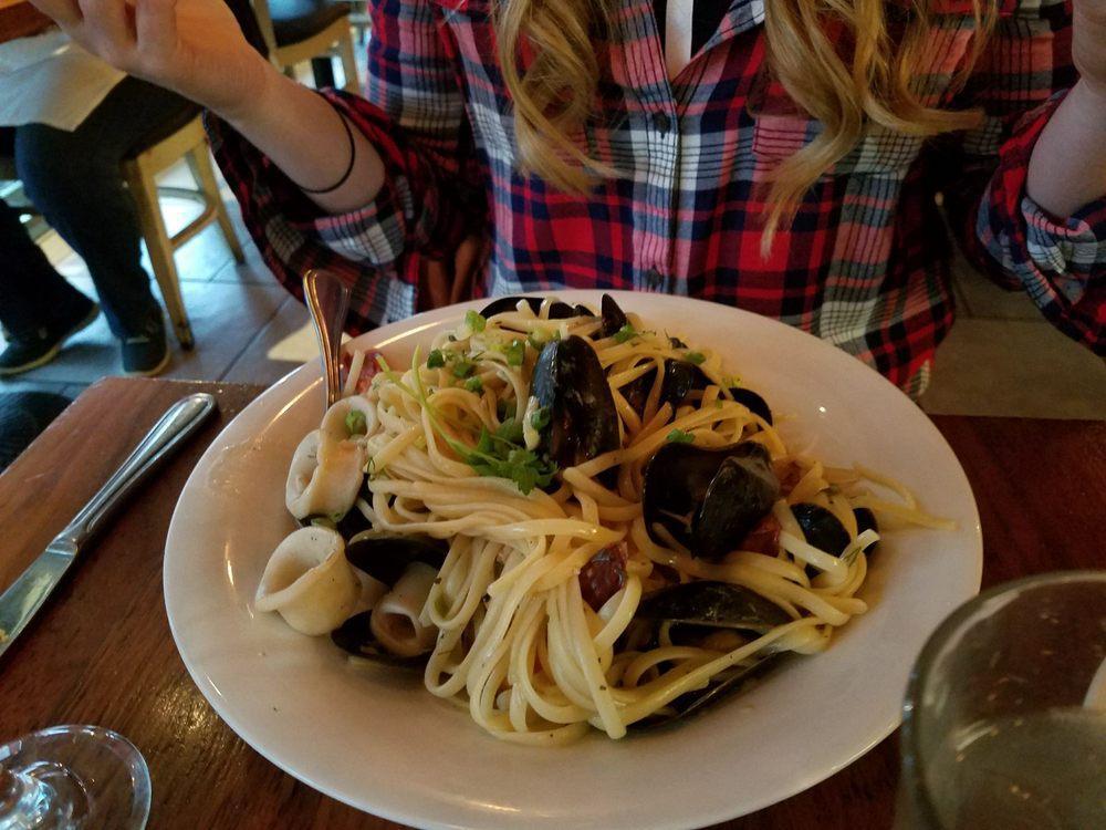 Seafood Pasta · Linguine with shrimp, calamari & mussels in white wine, dill, garlic and scallions.