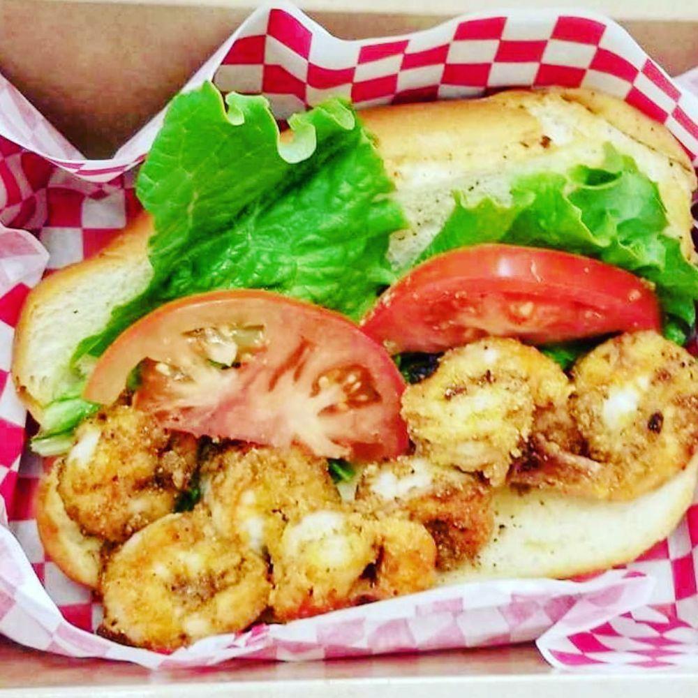 Fried Shrimp Po'boy Sandwich · This Po'boy is generously packed with succulent shrimp wrapped in our signature cornmeal-based breading.  These juicy bites of goodness combined with our tangy, special coleslaw make a winning combo.