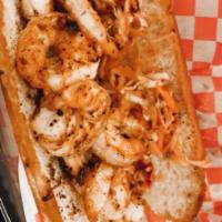 Grilled Shrimp Po'boy Sandwich · Calling all seafood lovers...the special blend of Cajun seasoning on these grilled shrimps r...