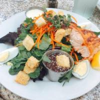 Atlantic Salmon Salad · Mixed greens, romaine, shaved carrots, croutons, boiled eggs and queso fresco. Tossed with o...