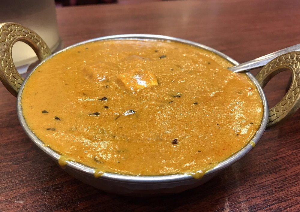 Paneer Tikka Masala · Homemade​ cheese cooked in special creamy sauce with house blend spices.