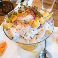Ceviche Divino · Pescado, avocado and mango marinated lightly in lime juice, peruvian limo chili, and fresh c...