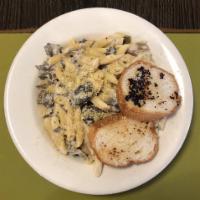 Mushroom Stroganoff · Penne pasta, button mushrooms, peppers, onions, sour cream, red wine, almond Parmesan, serve...
