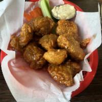 Buffalo Tigers · Tender tigers tossed in spicy buffalo sauce served with ranch.