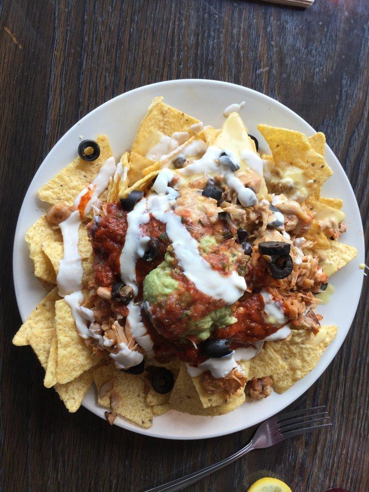 Nacho Mama · Mesquite jackfruit, black beans and rice, red sauce, cheese, sour cream, salsa Fresca, black olives, and guacamole. Gluten-free.