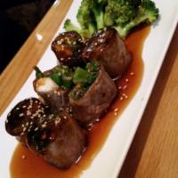 Beef Negimaki · Grilled thinly sliced beef, rolled with scallion and mozzarella cheese in teriyaki sauce.