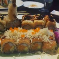 007 Roll · Spicy tuna, kani and avocado inside, topped with salmon, crunch, caviar, scallion with speci...