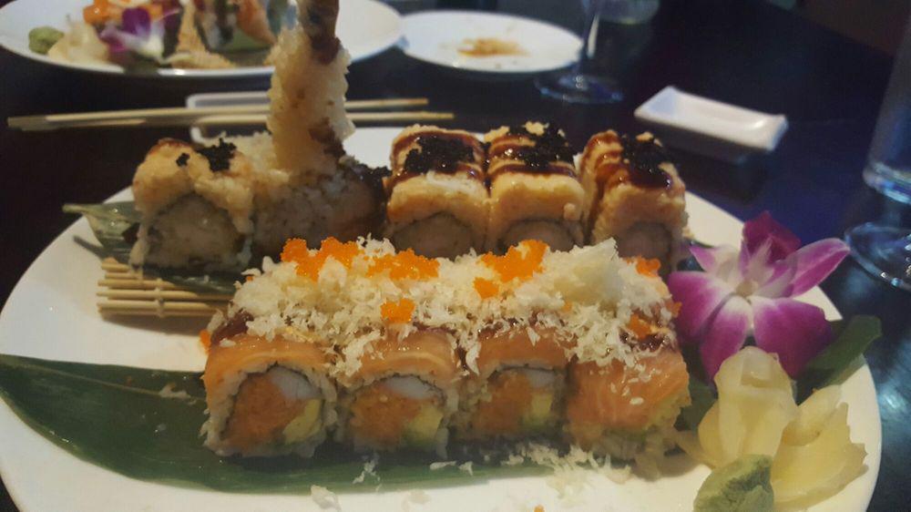 007 Roll · Spicy tuna, kani and avocado inside, topped with salmon, crunch, caviar, scallion with special sauce.
