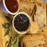 Chimichanga · Deep-fried burrito. Includes a side of mild sauce, salad, sour cream. Add guacamole for an a...