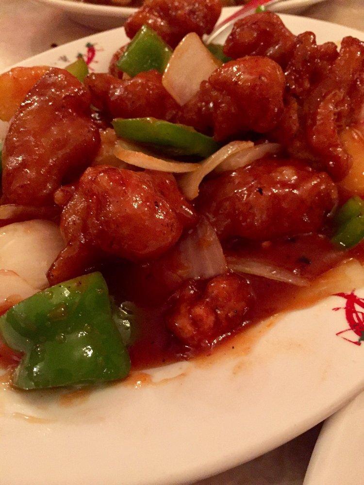 Sweet and Sour Chicken · Breaded white meat chicken sautéed with bell peppers, onions, and pineapple in a house-made sweet and sour sauce.