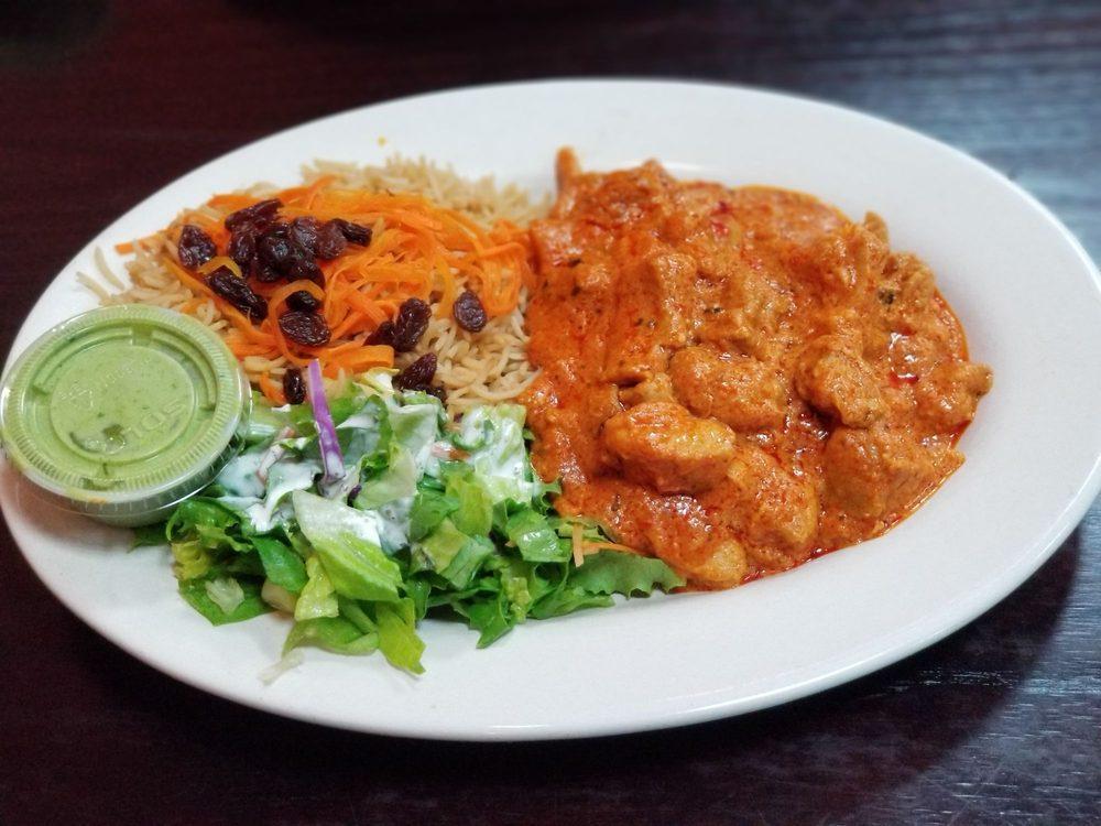 Butter Chicken · Boneless chicken cooked in butter and cream with spices.