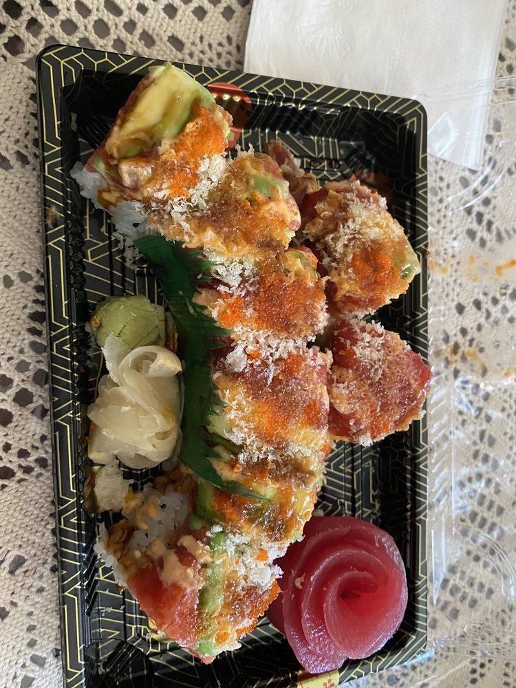 Garden State Special Roll · Shrimp tempura and cucumber, topped with spicy tuna, avocado, eel sauce, spicy mayo, crunch, and masago fresh tuna in a rose shape.