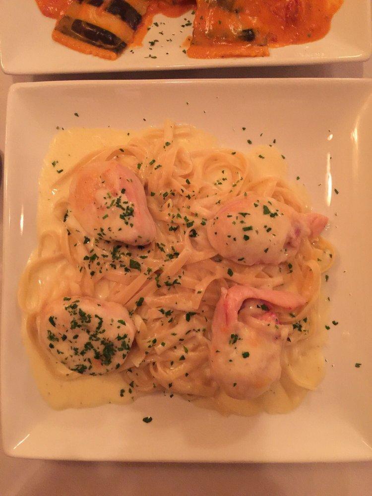 Chicken Cordon Bleu · Rolled with ham and Swiss cheese over fettuccine and Alfredo sauce.
