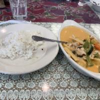 Red Curry · Served with choice of chicken, beef or tofu in savory coconut milk curry with bamboo shoots,...
