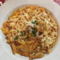 Baked Ziti · Ziti pasta with ricotta cheese, mozzarella and tomato sauce. Baked to perfection.