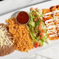 Enchiladas Plate · 3 enchiladas, your choice of meat, Monterey cheese, mom's signature red mole sauce topped wi...
