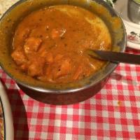 Chicken Tikka Masala · Barbecued cubes of chicken cooked with tomatoes, onions, and yogurt. An all time favorite. S...