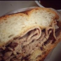 Roasted Beef Sandwich · Certified Angus beef slow-roasted for juiciness and flavor and moistened with jus. Sandwich ...