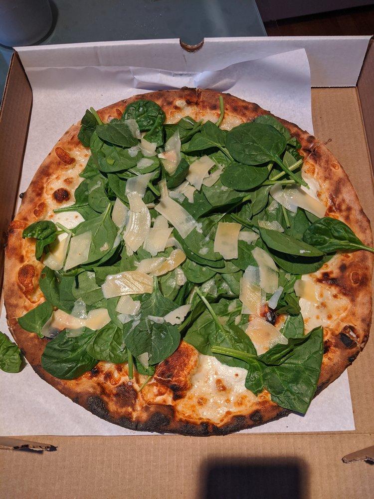 Popeye's White Pizza Napoletana · Ricotta, parmigiano, mozzarella, fresh raw spinach and extra virgin olive oil.