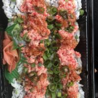 Dragon Maki · Popular. 8 pieces. Shrimp tempura uramaki topped with spicy ahi, green onions, and unagi sau...