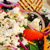 Greek Salad · Lettuce, tomatoes, cucumbers, onions, peppers, Kalamata olives, feta cheese with stuffed gra...